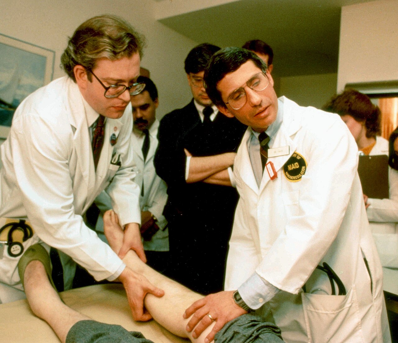Dr. Anthony Fauci examining an AIDS patient at NIH in 1987. Credit: NIAID
