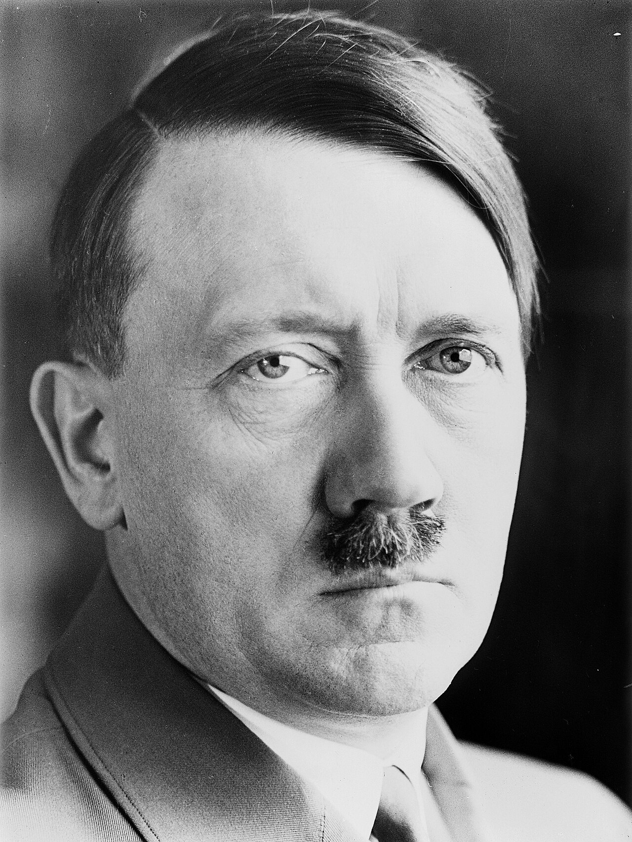 User comment: Portrait photograph of Adolf Hitler likely taken in 1932. The mirrored copy is reversed to the correct orientation; compare with the dir