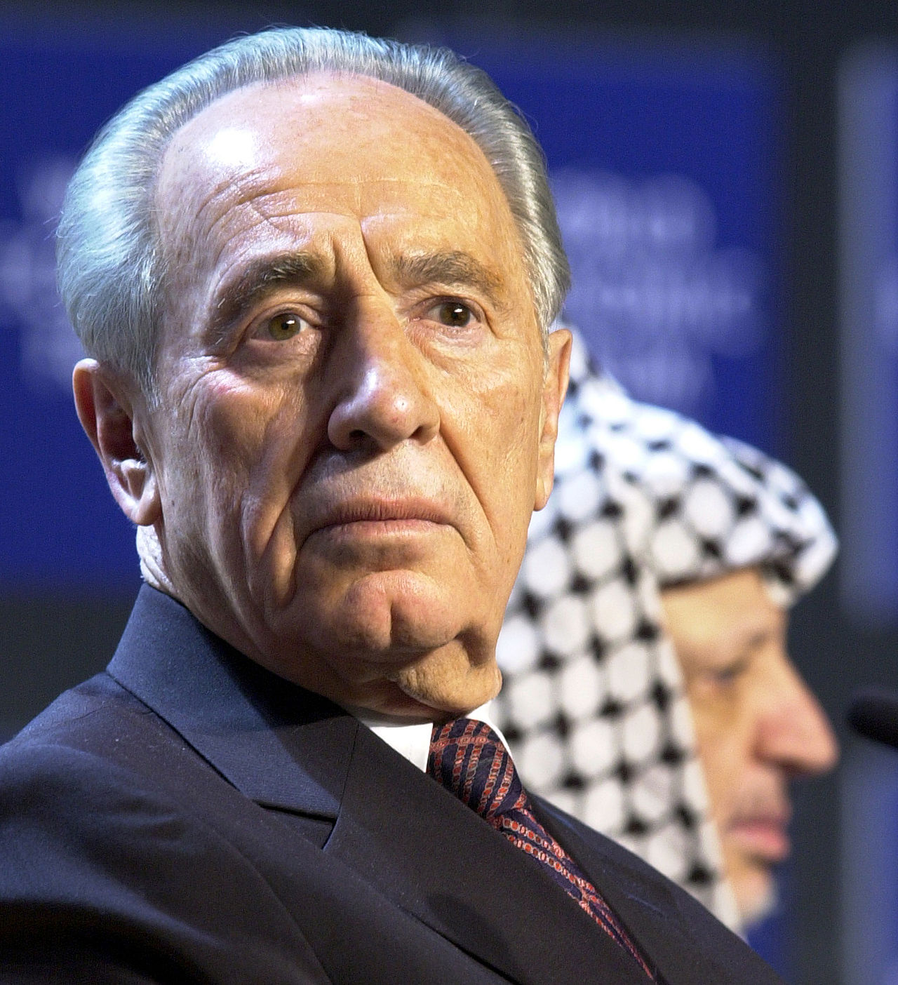 Original caption from the World Economic Forum: “DAVOS/SWITZERLAND,28JAN01 - Minister of Regional Cooperation of Israel Shimon Peres (L) and President