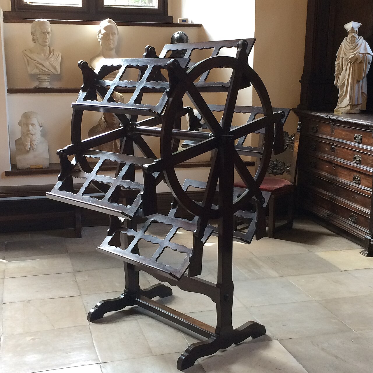 A bookwheel with space for six large books to lie open.